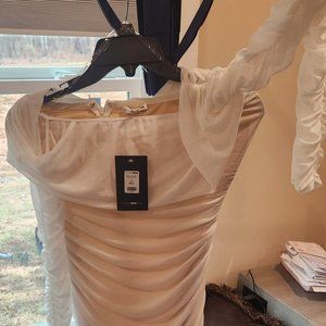 Sexy date night or girls night out and casual dress Has stretch.  Bodycon fit.
